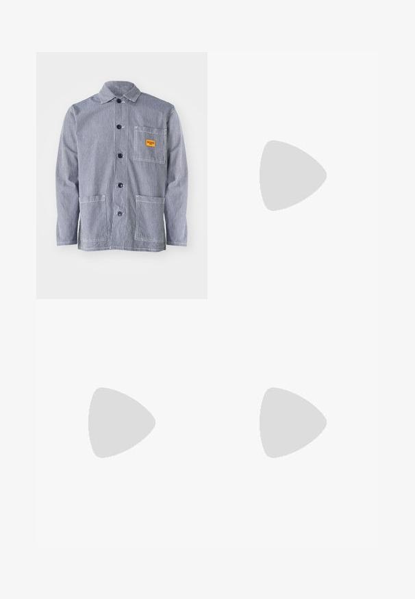 Striped work jacket in navy and white, featuring a button-up front, collar, chest pocket with yellow label, and two front pockets.; White short-sleeve t-shirt made of soft fabric. Features a classic crew neckline and a straight cut, with no visible patterns or accents.; Light brown, elastic waist pants with drawstring, featuring two side pockets and a relaxed fit. Fabric appears smooth with a subtle sheen.; Sneakers in beige, cream, and olive green, featuring suede and leather materials, a round toe, minimalistic design, and a rubber sole.