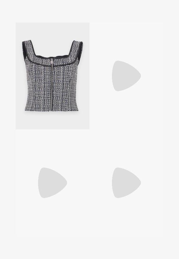 Top court en tweed bleu marine et blanc avec un encolure carrée, sans manches et une fermeture éclair à l'avant avec un tirette de marque.; Pantalon noir ajusté avec une coupe droite, présentant une texture lisse et des plis nets sur le devant. Aucune quincaillerie visible.; Baskets marron foncé avec doublure noire, logo en relief sur le côté, semelle épaisse blanche et semelle en caoutchouc couleur caramel sur un fond uni.; Sac à main en cuir noir avec un design structuré, featuring une forme cropped, une poignée supérieure et des accents en matériel doré. Bandoulière réglable incluse.