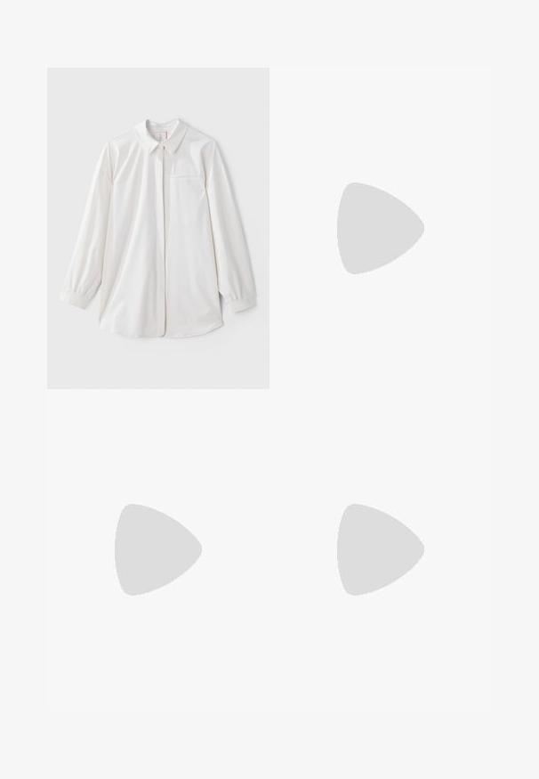 Biała koszula z długim rękawem, kołnierzykiem, zapięciem na guziki z przodu, kieszenią na piersi i ściągaczami na mankietach. Gładka tkanina o lekkim połysku.; Przycięta koszulka w jasnym różu, wykonana z miękkiego materiału. Posiada okrągły dekolt i krótkie rękawy z małym białym logo Nike na klatce piersiowej.; Jasnoszare spodnie o szerokich nogawkach, wykonane z gładkiego materiału. Posiadają elastyczny pas i czarne logo Nike po lewej stronie.; Buty sportowe Nike z górą z siateczki w kolorze srebrnym, białymi akcentami i teksturowanymi podeszwami, w połączeniu z luźnymi granatowymi spodniami.