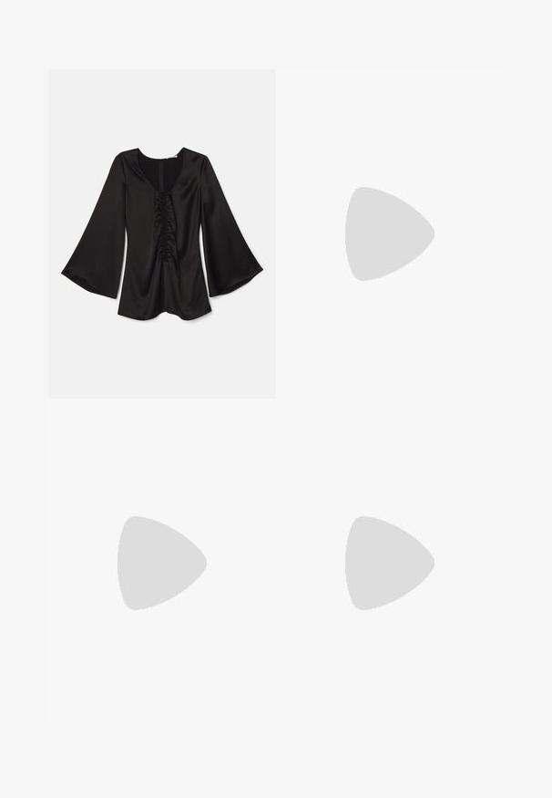 Black satin blouse with long, flared sleeves. Features a deep scoop neck and ruched detail down the center. Smooth texture. Back zip closure.; Beige wide-leg trousers featuring a diagonal black stripe pattern, an elastic waistband, and a contrasting black hem at the cuffs.; Black leather sandal with a square toe, thin straps, adjustable ankle strap, and a low heel. Features a small gold accent on the strap.; Black crocodile-embossed leather handbag with a structured design, top handle, adjustable strap, and a prominent front logo detail.