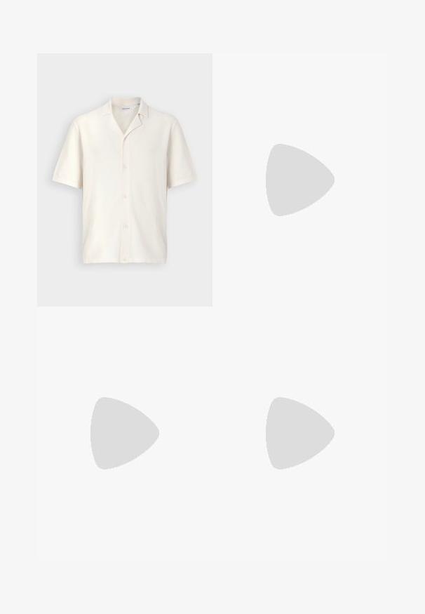 Short-sleeve shirt in cream color, featuring a textured fabric, notched collar, and five buttons down the front.; Two crew-neck t-shirts in black and olive green, made of soft cotton fabric. The design is simple with short sleeves and a straight cut.; Black athletic pants made of textured fabric, featuring an adjustable waistband, zippered side pocket, and tapered cuffs.; White leather sneakers with a thick cream sole, navy heel accent, and side logo. Smooth texture, minimalist design, featuring lace-up closure.