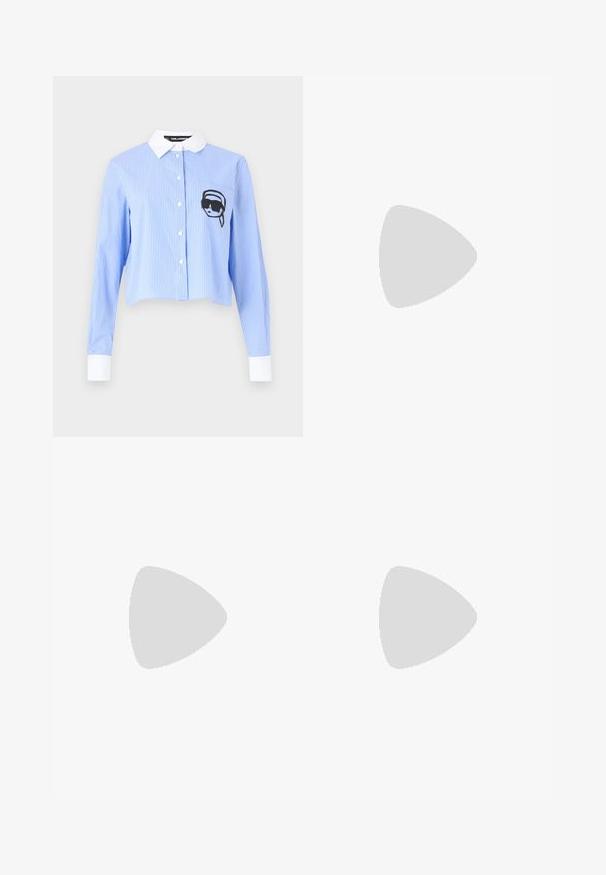 Blue and white striped button-up shirt, cropped length, featuring a black graphic of a head in sunglasses on the chest pocket. White collar and cuffs.; Black wide-leg trousers with a high waist, pleats at the front, and a belt featuring a buckle. Made from smooth, lightweight fabric.; Black patent leather loafers with decorative silver studs, round toe, low block heel, and smooth shiny texture.; Black leather handbag with a structured design, chain and handle accents, and a textured surface. Features a flap closure with branding visible.