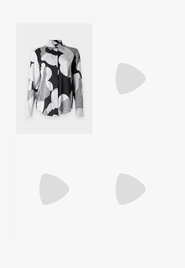 Marimekko MAIJA UNIKKO - Gombos blúz - black/white; Plisszírozott fehér szoknya fekete elasztikus derékkal, amelyen a "LACOSTE" logó található. Középhosszú kialakítás, puha tapintással.; Fehér bőr sportcipők vastag fehér talppal, fekete velúr sarokpikkelyel és dombornyomott logóval az oldalon. Fűzős kialakítás, hat fűzőlyukkal.; Fekete, nagyméretű napszemüveg geometrikus formával, sötét lencsékkel és kontrasztos szürke részlettel a kereten. Logó a szárán.