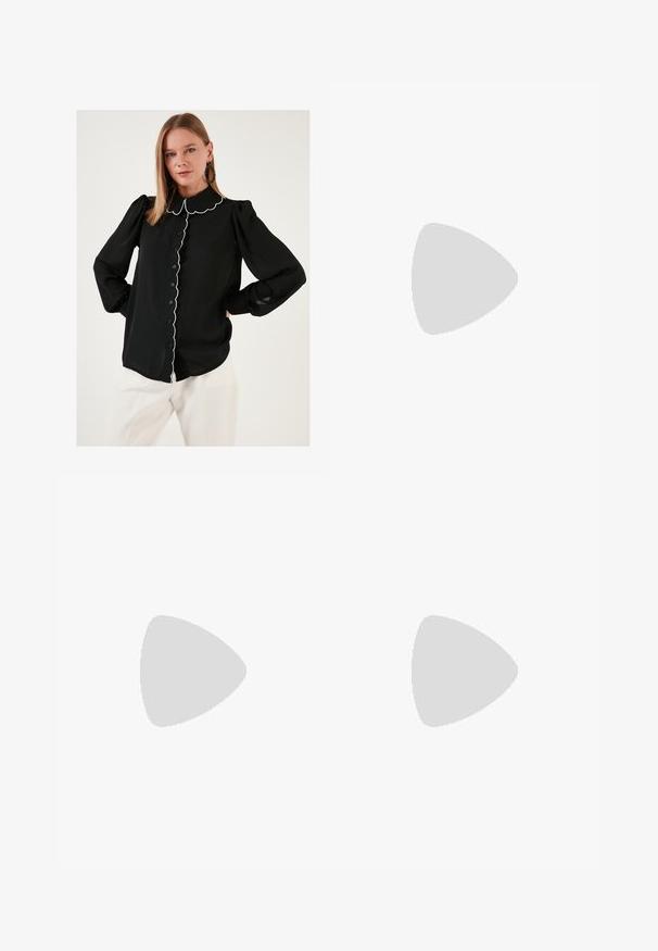 Black blouse with scalloped collar and white trim, button-down front, long puffed sleeves, and lightweight fabric. Worn with white trousers.; Beige wide-leg jeans with a high waist, featuring a button closure, front pockets, and frayed hem. Made of denim fabric.; White high-heeled sandal with a chunky heel, featuring a strappy design and ankle tie. Smooth texture with a platform front for added height.; Even&Odd Handbag - brown