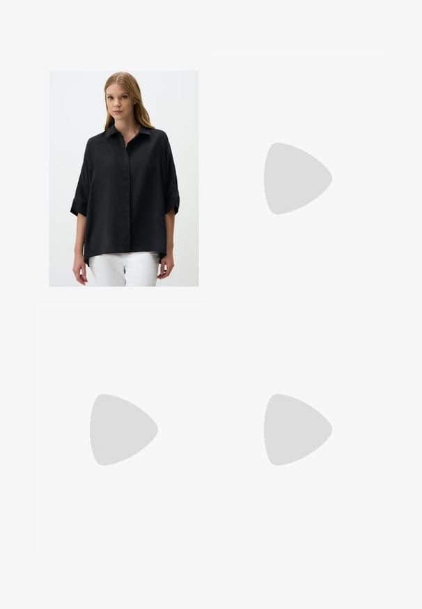 Black, loose-fitting shirt with a collar, button front, and short rolled sleeves. Smooth texture; longer back hem. Pair with white pants.; Wide-leg trousers in dark brown fabric. Features include pleats at the front, a waistband with belt loops, and side pockets. Smooth texture.; Black leather shoes with a chunky, ribbed sole, featuring a circular silver hardware accent and minimal stitching detail.; Black leather handbag with a structured shape, short dual handles, gold-tone hardware, and a side tag accessory. Smooth, textured finish.