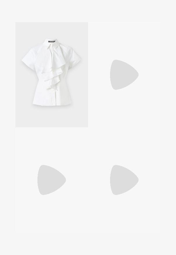 White blouse featuring a collared neckline and short sleeves. Ruffled detailing runs down the center, made from smooth cotton fabric.; Black trousers featuring a straight cut, smooth texture, and a waistband with a single button closure. No visible patterns or accents.; Black leather high-heeled shoe with pointed toe, ankle strap, and a thin heel. Smooth texture with a gold accent on the heel base.; Beige leather handbag with a structured, triangular shape, featuring a silver chain handle and a cursive logo in metal.