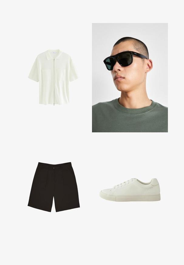 Krátký rukáv, bílá zipová košile z texturované látky, s límečkem a dvěma předními kapsami se čtvercovými klapkami.; Černé šortky vyrobené z hladkého materiálu, s jedním předním knoflíkem, skladbami a bočními kapsami, navržené pro uvolněný střih.; Bílé kožené tenisky s texturovaným svrškem, kulatou špičkou, šesti oky a plochou gumovou podrážkou. Jemné švy na patě.; Černé obdélníkové sluneční brýle s tmavými skly, které mají charakteristický tvar a logo na straně. Nosí je osoba v zelené košili.