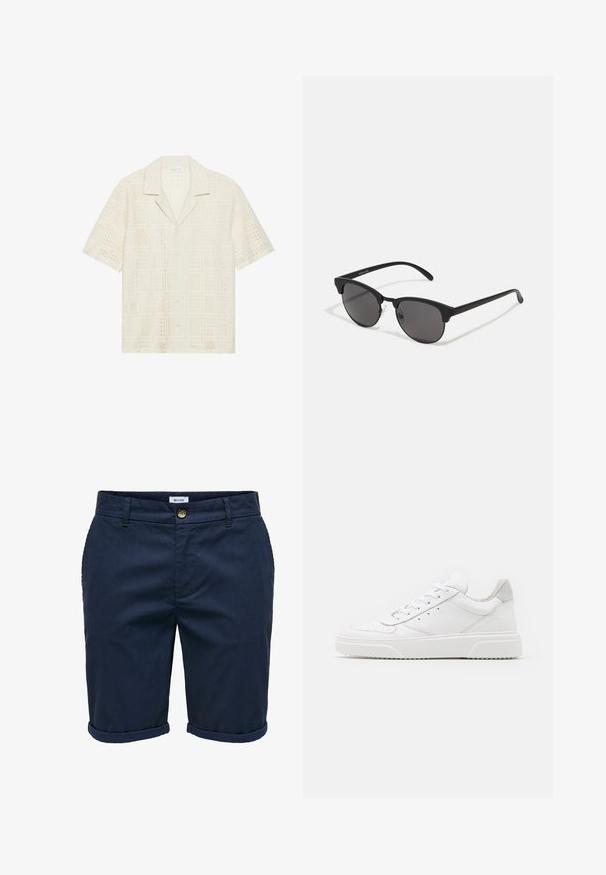 Short-sleeve shirt in light cream fabric, featuring a textured, perforated design with square patterns and a pointed collar.; Navy blue shorts made of textured fabric with a button closure, turned-up hems, and side pockets, featuring a subtle pattern.; White leather sneakers with a smooth finish, rounded toe, flat laces, and a textured sole. Grey suede accent at the heel.; Black sunglasses with round lenses, matte finish, and distinctive cat-eye shape. Slim arms with subtle branding on the left temple.