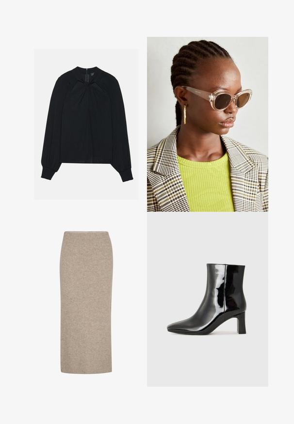 Schwarze Bluse aus leichtem Stoff mit gefaltetem Vorderteil, hohem Kragen und elastischen Manschetten, die einen verdeckten Reißverschluss im Rücken hat.; Beige, gerippter Midirock aus weichem Stoff mit taillierter Silhouette und elastischem Bund. Einfaches Design ohne Verzierungen.; Schwarzer Lackleder-Stiefelette mit spitzer Zehe und einem mittelhohen Blockabsatz. Glatte Textur und minimalistisches Design.; Klare Cat-Eye-Sonnenbrille mit braunen Gläsern und transparentem Gestell. Modell trägt ein grünes geripptes Oberteil und einen karierter Blazer. Goldene Hoop-Ohrringe.