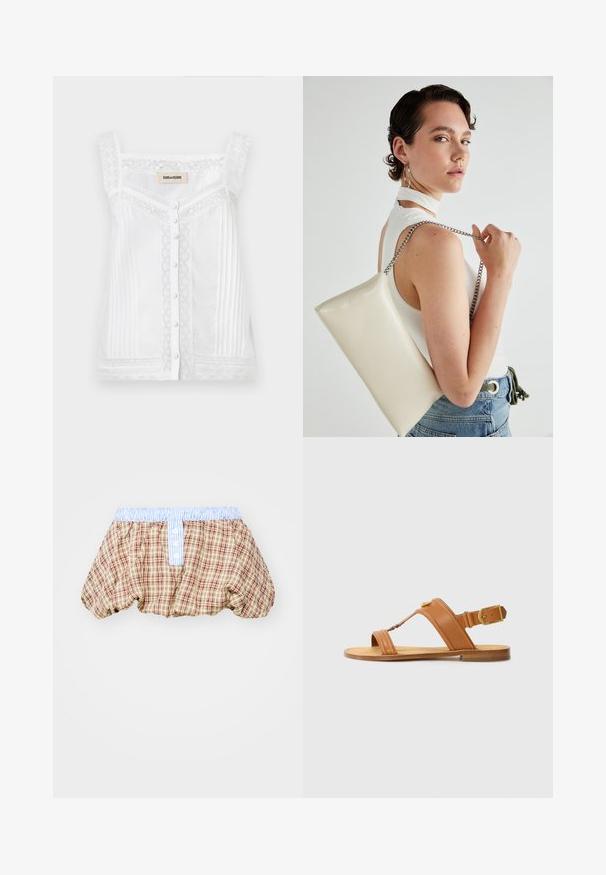 Haut sans manches blanc avec des détails en dentelle, des plis verticaux et une fermeture à boutons à l'avant. Dispose d'un col en dentelle festonné et de bretelles.; Shorts bouffants à carreaux en marron, beige et rouge avec une ceinture rayée bleu clair et des détails de boutons à l'avant.; Sandales en cuir marron avec sangle de cheville réglable, semelle plate et sangles supérieures croisées. Texture lisse, design minimal, accent matériel doré.; Pochette rectangulaire blanche en matériau brillant, avec une bandoulière en chaîne argentée. Le modèle pose en mettant en valeur le sac contre un fond uni.