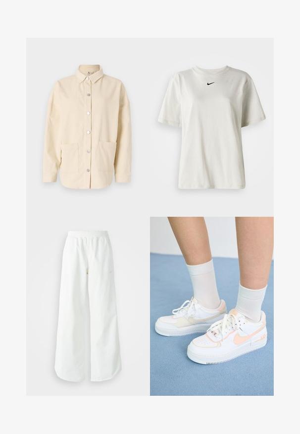 Giacca camicia in corduroy crema con colletto, chiusura con bottoni in argento e due tasche frontali. Vestibilità rilassata e tessuto testurizzato.; T-shirt bianco in cotone con scollatura rotonda e maniche corte. Presenta un piccolo logo Nike nero sul petto. Design semplice e privo di ornamenti.; Pantaloni sportivi bianchi a gamba larga con vita a coste e delicato dettaglio del logo. Tessuto liscio con vestibilità rilassata e orlo affusolato.; Sneakers bianche con accenti pesca, tomaia in pelle liscia, punta perforata, suola texturizzata e lacci. Indossati con calzini bianchi a sbalzo su una superficie blu.
