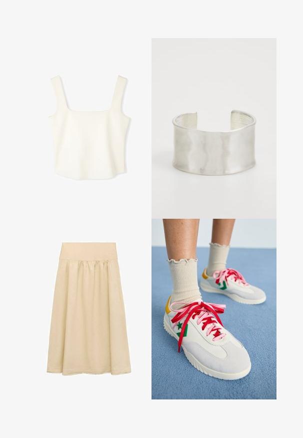 Weißes, tailliertes Crop-Top mit quadratischem Ausschnitt, breiten Schulterträgern und glatter, weicher Textur, gestaltet im minimalistischen Stil.; Beige Midi-Rock aus leichtem Stoff, mit einem elastischen Bund, gerafftem Design und einem Saum mit subtilen Fransen.; Weiße und graue Sneakers mit roten und rosa Schnürsenkeln, grünen Sternelementen und einer gelben Fersenschlaufe. Getragen mit gerippten beigen Socken. Blauer Hintergrund.; Zign Armband - silver-coloured