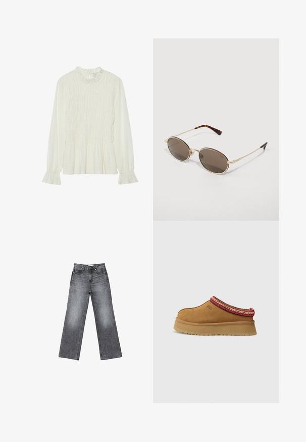 Bijela bluzica dugih rukava s volanima oko vrata, nabranim dijelom tijela i lepršavim manžetama, napravljena od teksturirane tkanine s peplum donjim dijelom.; Kratke tamno sive traperice širokih nogavica s izblijedjelim završetkom, pet džepova, zatvaranjem na dugme i suptilnim detaljima šivanja uz šavove.; Smeđe zamšaste cipele na sklizanje s crveno-cream uzorkom oko ruba, teksturiranim potplatom i UGG logom sa strane. Imaju blagu platformu.; Naočale s ovalnim smešnim lećama, zlatnim metalnim okvirom i dušičastim cvjetnim ukrasima na obrvi i krakovima, s vrhom od kornjačevine.