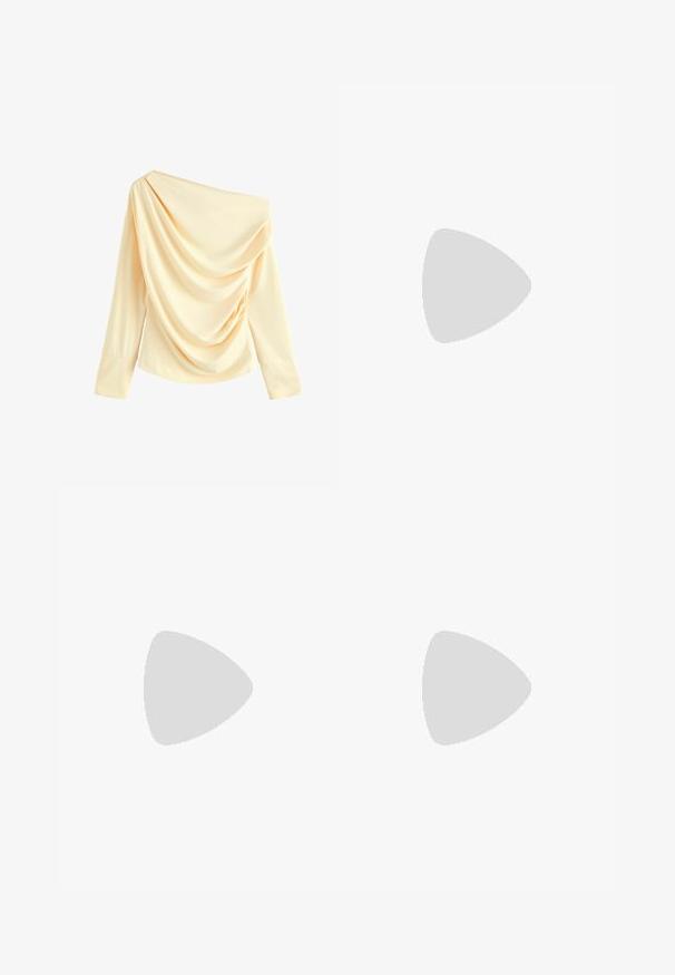 Off-the-shoulder cream top with draped fabric, long sleeves, and a smooth texture. Features an asymmetrical neckline and gathered detail.; Striped midi skirt in soft cotton with a light yellow base and blue horizontal stripes. Features a ribbed elastic waistband.; Pink athletic shoes with light blue stripes, round toe, and thick pink laces, paired with pink track pants featuring white side stripes.; Yellow patent leather handbag with a rounded shape, single top handle, and a silver logo plate. Features a zip closure and smooth texture.; Five bracelets: a dark wood bangle, two gold-tone metal chains, and two amber-colored resin rings with gold accents and smooth textures.