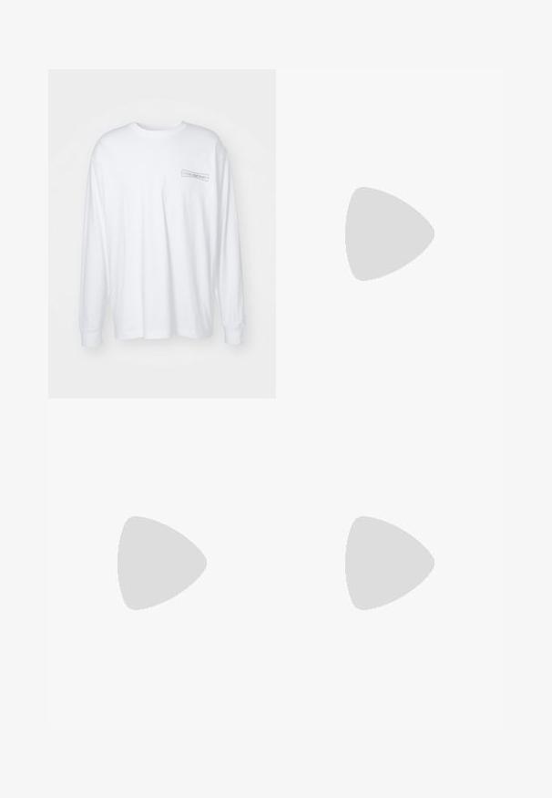 Long-sleeve white t-shirt made of cotton. Features a textured logo in gray on the left chest area. Classic crew neck and relaxed fit.; Light green trousers made of cotton with a straight leg design, featuring a smooth texture and standard waistband with belt loops.; Red suede sneakers with white accents, featuring textured material, round toe, and a gold logo on the side, worn with black pants.; Black sports sunglasses with gray lenses, a curved frame design, and logo detail on the side. Made from lightweight plastic material.
