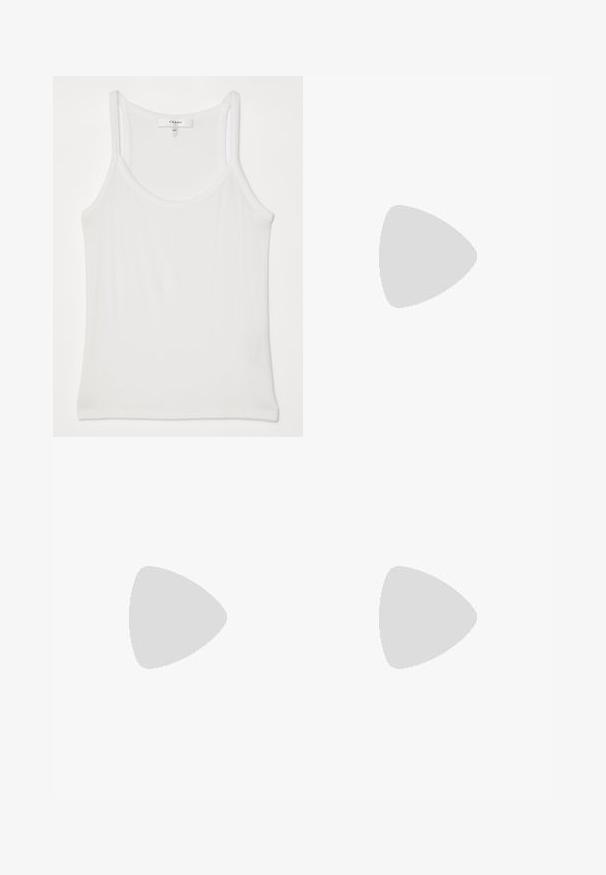 White sleeveless tank top made of soft, ribbed fabric; features thin straps and a round neckline, tag reads "FRAME."; White long-sleeve shirt made of cotton, featuring a classic collar, button closure, and a single breast pocket on the left side.; Blue jeans made of denim, featuring a straight leg design, five pockets, a button fly, and subtle faded areas on the thighs.; Black leather ballet flat with a rounded toe, smooth texture, minimal stitching detail, and a flexible sole design.