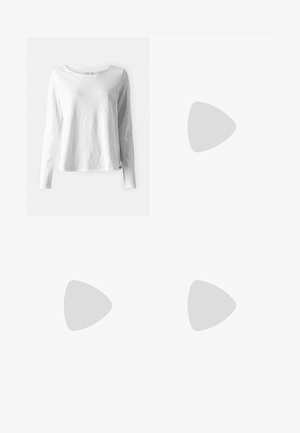 Long-sleeve white T-shirt in soft, lightweight fabric; features a round neck and slightly relaxed fit; tag visible on the side.; High-waisted, wide-leg jeans in dark blue denim with a smooth texture, contrast stitching, and five-pocket design. Front button closure.; Low-top sneakers with a white synthetic upper, pink and gray suede accents, textured white rubber sole, and colorful laces.; Tan leather shoulder bag with embossed logo, smooth texture, adjustable strap, and minimalistic design. Features a single main compartment.