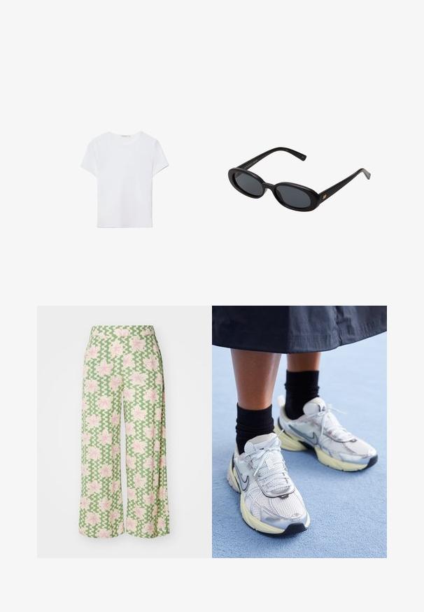 Bela kratka majica s kratkimi rokavi, izdelana iz mehkega materiala. Ima okroglo izrez in preprost, čist dizajn s ravnim robom.; Široki hlače iz zelene tkanine s valovitim vzorcem in roza cvetovi. Pas je raven, kar povečuje sproščen slog.; Bele in srebrne Nike teniske z mrežasto tkanino, refleksnimi poudarki in bež podplatom. Nosi se z črnimi nogavicami, stoji na modri površini.; Črne oversize sončne očala z ovalnimi lečami, gladkim plastičnim okvirjem in zlatenimi detajli na templjih. Temne leče zagotavljajo zaščito pred soncem.