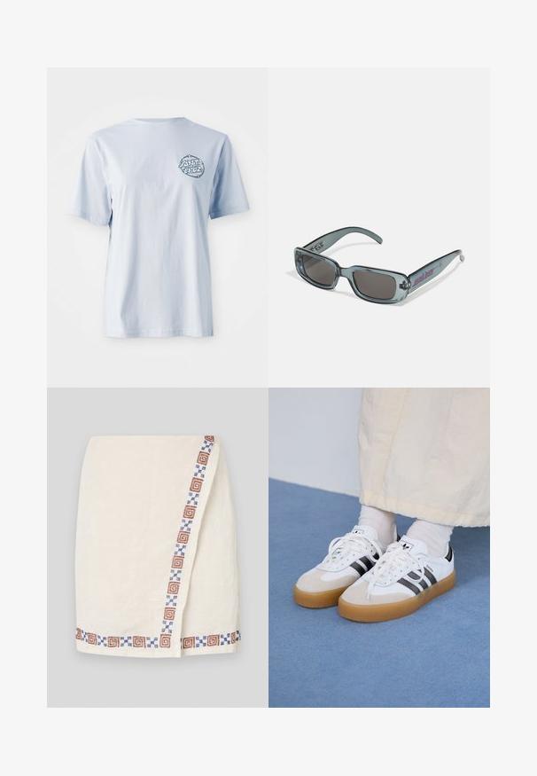 Heleda sinine puuvillane t-särk lühikeste varrukatega, millel on tumeda sinise värvusega ringikujuline graafiline logo vasakul rinnaku piirkonnas.; Kreemivärvi wrap seelik, millel on tekstuuriga kangas ja millel on ühe külje ääres prinditud piir, kus on pruuni ja sinise geomeetrilise mustriga kujundid.; Valged tossud mustade triipudega ja beeži nahaga aktsentidega. Omavad tekstuuriga kummist talla ja lamedaid valgeid paelu, kantud heledate sokkidega.; Santa Cruz INFERNO UNISEX - Päikeseprillid - crystal black