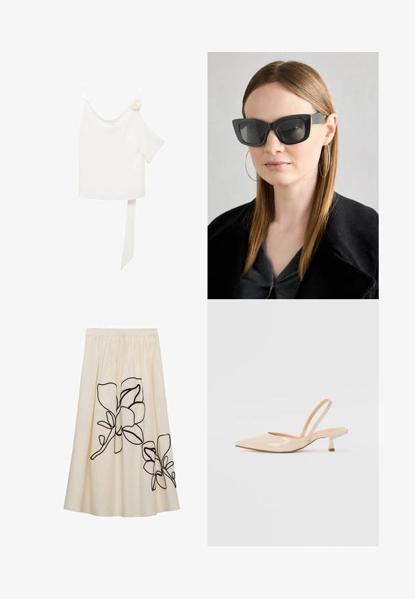 Hvid bluse med en skulderdesign, der har en blomsterdetalje på den ene side og et langt bundet panel om livet. Glat tekstur.; Cremefarvet nederdel med sort blomsterbroderi, med en samlet talje og en flydende design, lavet af et let stof.; Beige patenteret læder slingback høje med spids tå og en slank, firkantet hæl. Glat tekstur og minimalistisk design uden udsmykninger.; Sorte katteøje solbriller med mørke linser, tykke rammer og subtile detaljer. Båret med en sort frakke og en grå bluse, med langt, glat hår.