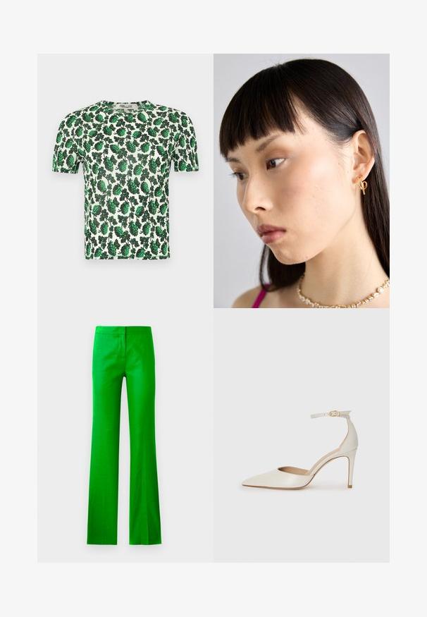 Zöld virágos, rövidujjú blúz, amely nagy leveleket ábrázoló mintákkal díszített fehér háttéren, könnyű és rugalmas anyagból készült.; Fényes zöld, harangszárú nadrág sima anyagból, lapos elülső résszel és látható zsebek nélkül. Tiszta, minimalista dizájn.; Fehér bőr, magassarkú cipő hegyes orral, bokapánttal és vékony tűs sarkal. Simaszövet, finom fényes felülettel.; Arany fülbevaló, amelyet a jobb fülön viselnek, nyitott dizájnnal. A modellen egyenes, sötét haj és minimális smink található.