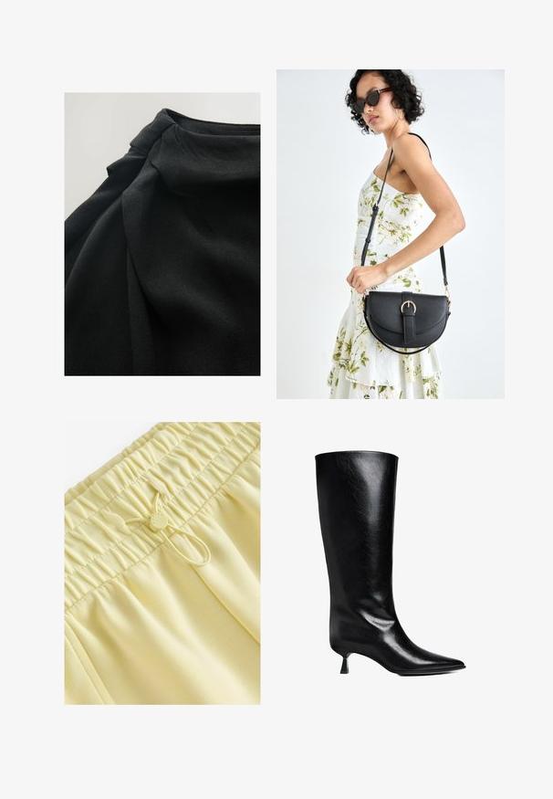 Crni materijal s mekom, teksturiranom površinom, s drapiranim slojevima i nabranim detaljem na vrhu, naglašavajući fluidnost u dizajnu.; Žute kratke hlače s elastičnim pojasom, naboranom teksturom, podesivom vezicom i glatkom tkaninom. Jednostavan dizajn bez uzoraka ili detalja.; Crne kožne čizme do koljena s oštrim nosom, uskim siluetom i niskom blok petom koja ima sjajnu završnu obradu.; Crna kožna torba s lukovitim oblikom, odvojivim remenom i zlatnim detaljima. Torba ima preklop s kopčom.