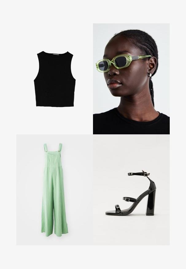 Črn brez rokavov crop top, izdelan iz gladkega materiala, z okroglim izrezom in čistim, preprostim dizajnom brez vzorcev ali dodatkov.; Zelene široke naramnice iz teksturiranega blaga, z nastavljivimi trakovi in sprednjimi žepi z medeninastimi gumbi.; Črne lakirane sandale s peto, kvadratnim prstom, trakovi okrog gležnja in srebrnimi zaponkami. Opremljene so s stabilno Debelo peto.; Zelene očala s tankim pravokotnim okvirjem in temnimi lečami; teksturirane sive ročke z blagovno znamko. Gladka koža in črna majica.