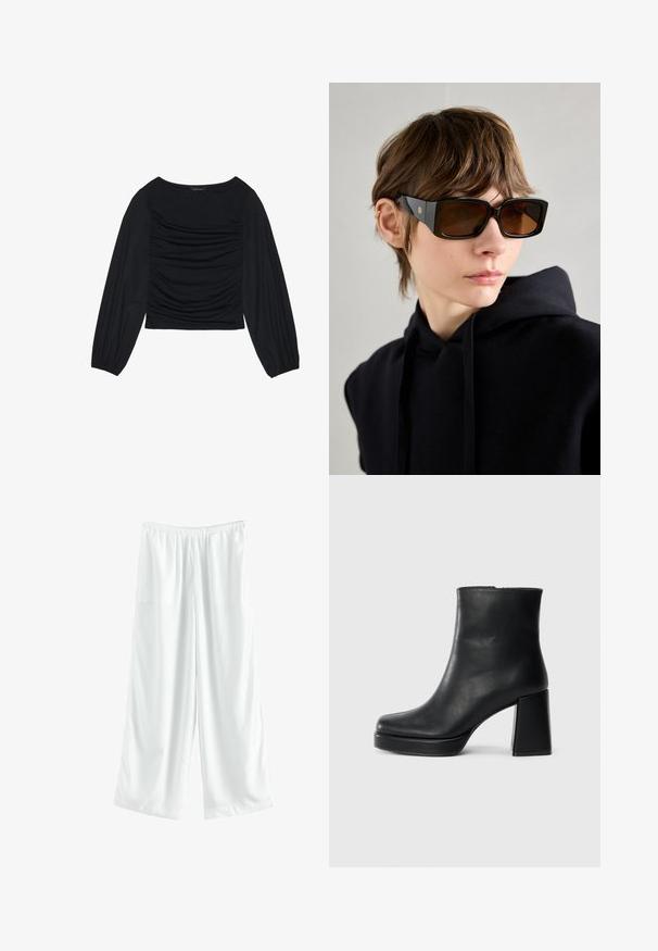 Crna bluzica dugih rukava s naboranim detaljima na prednjem dijelu i na zapešćima, izrađena od mekog, rastezljivog materijala s izrezom u obliku čamca.; Bijele široke hlače s elastičnom stražnjom trakom, izrađene od glatkog materijala, s lepršavim krojem i bez vidljivih uzoraka ili akcenta.; Crna kožna čizma do gležnja s blok petom i platformom, prikazana s bočne strane na jednostavnoj bijeloj pozadini.; Crne oversize sunčane naočale s sjajnom završnom obradom, pravokutnog oblika, smeškim staklima i zlatnim logotipom na ručkama.