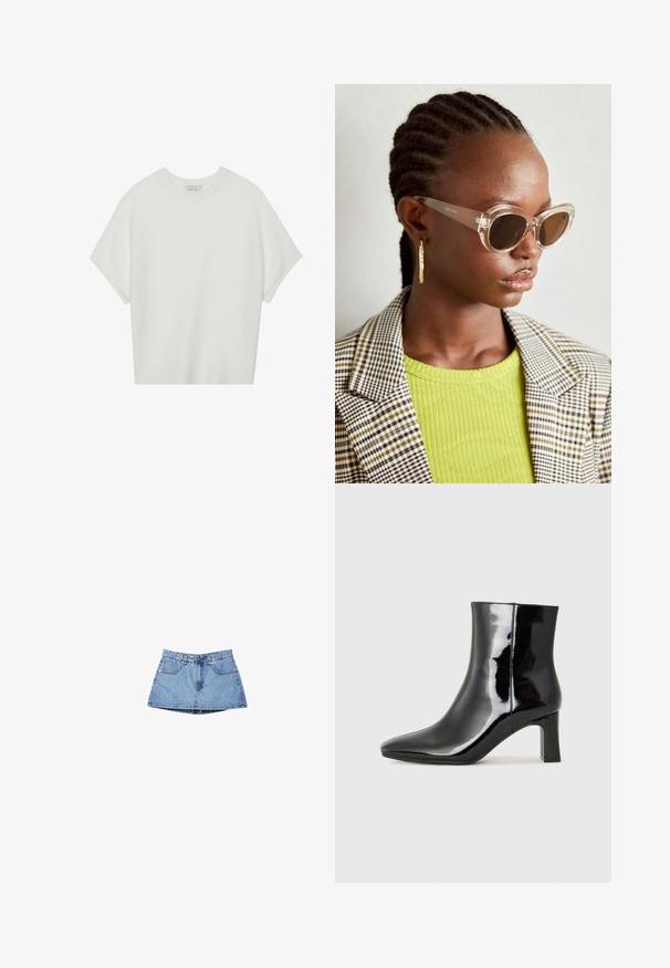 Biała koszulka z krótkim rękawem o szerokim dekolcie, wykonana z miękkiego materiału, z fakturowanym prążkowanym wzorem, charakteryzująca się luźnym krojem i minimalistycznym designem.; Jasnoniebieska spódnica dżinsowa z wysokim stanem, przednimi kieszeniami i lekko rozkloszowanym dołem. Gładka faktura z minimalnymi akcentami szwów.; Czarne lakierowane botki za kostkę z wysmukłym noskiem i średniej wysokości obcasem w kształcie słupka. Gładka tekstura i minimalistyczny design.; Przezroczyste okulary w kocim kształcie z brązowymi soczewkami. Modelka w zielonym, prążkowanym topie i w kratkę żakiecie. Złote kolczyki w kształcie kół.