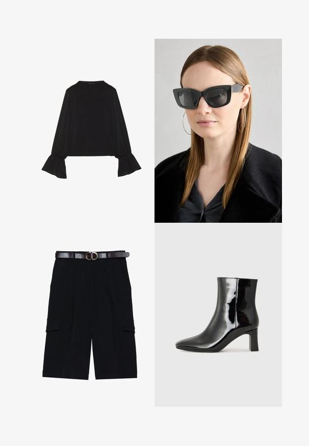 Črn dolg rokav vrh z razširjenimi manšetami, mehko teksturo in sproščenim krojem, z preprostim okroglim izrezom.; Črne cargo kratke hlače iz lahkega blaga, s širšim krojem, stranskimi žepi in rjavim usnjenim pasom s srebrno sponko.; Črne lakirane gležnjarje z ošiljenim nosom in srednje visokim blokastim peto. Gladka tekstura in minimalističen dizajn.; Črne mačje očala s temnimi lečami, debelimi okvirji in subtilnimi detajli. Oblečena z črnim plaščem in sivim zgornjim delom, z dolgimi ravnimi lasmi.