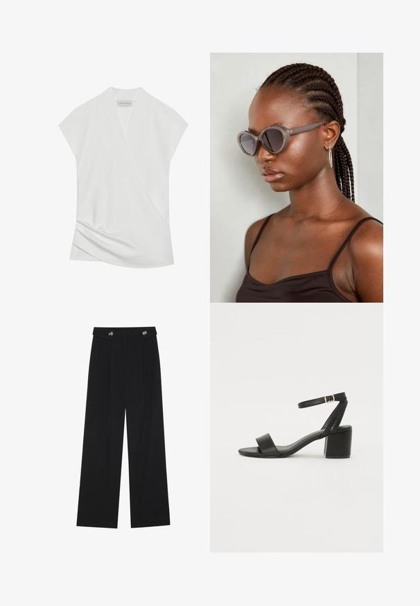 Biała bluzka krótki rękaw z krojem typu wrap, z delikatnym marszczeniem u dołu i gładką, miękką teksturą. Metka mówi "ANNA FIELD."; Czarne szerokie spodnie z wysokim stanem, z detalami w postaci guzików na pasku oraz plisami z przodu.; Czarne sandały na obcasie z gładkiej skóry, z odkrytymi palcami, szerokimi przednimi paskami oraz regulowanym paskiem na kostkę z detalem w postaci złotego zapięcia.; Szare, przerośnięte okulary przeciwsłoneczne o zaokrąglonym kształcie i ciemnych soczewkach. Smukła plastikowa oprawka o gładkim wykończeniu. Model ma warkocze.