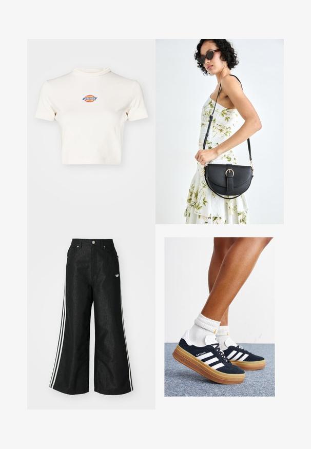 Crème-kleurige cropped t-shirt met een hoge halslijn, korte mouwen en een cirkelvormig logo met "Dickies" in blauw, rood en geel.; Zwarte denim broek met wijde pijpen, voorzien van drie witte strepen aan elke zijkant en een klein wit logo. Heeft voorzakken en een knoopsluiting.; Zwarte suède sneakers met witte strepen en accenten, ronde neus, gum rubberen buitenzool, gecombineerd met witte geribbelde crewkousen.; Zwarte leren handtas met een gebogen vorm, afneembare schouderband en gouden hardware. De tas heeft een klep met een gespsluiting.