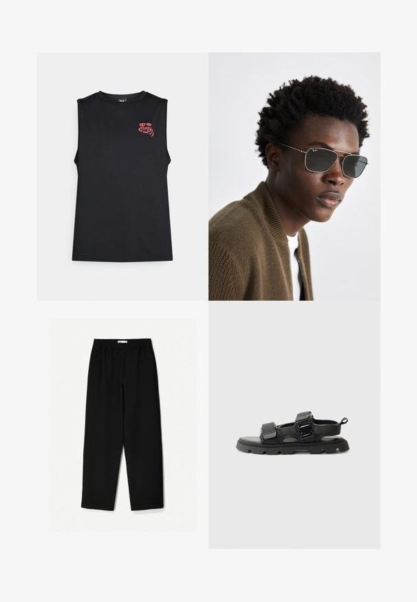 Black sleeveless tank top with red stylized "Karma" text and abstract eyes graphic on the upper left chest.; Black, wide-leg pants made from a lightweight fabric. Features an elastic waistband and a smooth texture. No visible patterns or hardware.; Black sandals with a textured fabric upper, wide straps, metal buckle accents, and a thick rubber sole featuring a lug pattern.; Sunglasses featuring a silver metal frame, aviator shape, and dark tinted lenses. Styled with a ribbed brown bomber jacket.