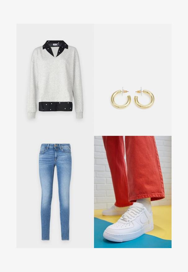 Sweat-shirt gris avec un col en V et des manches longues, présentant un ourlet et un col à pois noirs, fabriqué en tissu doux.; Jean skinny bleu clair avec un léger délavage, cinq poches et une fermeture par bouton à l'avant. Fabriqué en denim avec une texture lisse.; Baskets blanches en cuir avec une boîte à orteils perforée, semelle texturée et lacets blancs, associées à un large pantalon rouge et un fond bleu et jaune.; Boucles d'oreilles en or avec une finition lisse et brillante. Design circulaire présentant un petit clou et une attache transparente pour un port sécurisé.