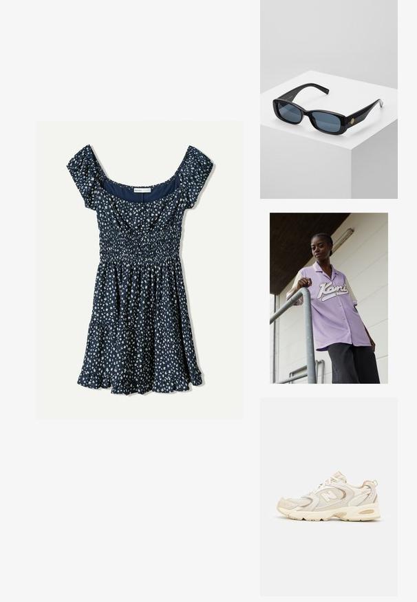 Fialová košeľa s krátkym rukávom a krémovým golierom, s veľkým bielym písaným logom na prednej strane. Model stojí pri kovovom zábradlí.; Námornícky modré šaty s bielym kvetinovým vzorom, smockovaná živôtik, krátke puffové rukávy a sukňa so splývavým lemom končiacim volánikom.; Bežové športové topánky s sieťovinou a syntetickými prekrytiami, s textúrovaným povrchom, polstrovaným golierom a odpružením "ABZORB" na päte.; Čierne obdĺžnikové slnečné okuliare s tónovanými modrými šošovkami, robustným rámom a zlatým kruhovým akcentom po boku. Elegantný, lesklý povrch.