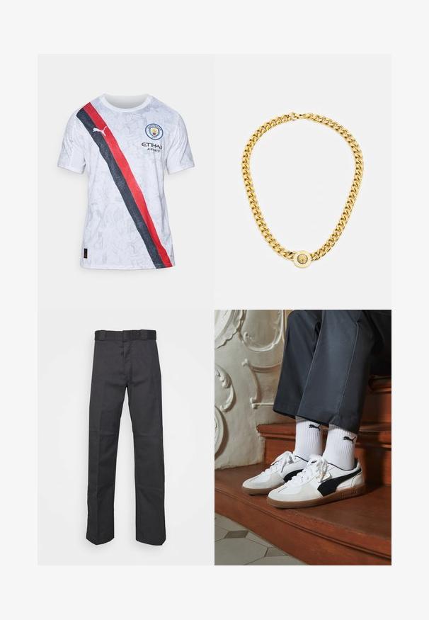 Bela kratkotrajna majica z rdečo in črno diagonalno črto, grafičnim vzorcem, logotipom Manchester City in blagovno znamko Puma.; Črne hlače iz trpežnega blaga, z ravnim krojem, pasom z zankami za pas in šivi za dodano teksturo.; Puma superge v beli in črni usnjeni izvedbi, sročene s rjavim gumijastim podplatom. Usklajene z belimi nogavicami z črnim logotipom, nosijo se s temnimi hlačami.; Zlata verižica z velikimi medsebojnimi povezavami, ki ima v središču krožni obesek z izbočenim grbom.