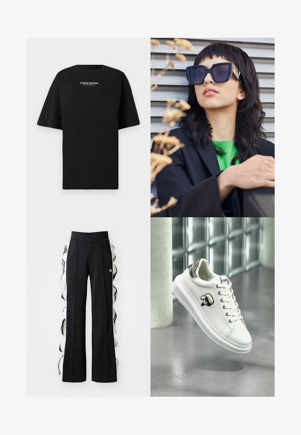 Svart oversized t-skjorte laget av bomull, med rund hals og korte ermer, med "STUDIO EDITION" trykt i hvitt.; Svarte treningbukser med teksturert liv, med hvite sidestykker og rynket detaljering, samt et brodert logo på forsiden.; Hvit Karl Lagerfeld-sneaker med snøring i front, svart og beige logo-patch, og metallisk sølv hæltab, flytende over et grått gulv.; Overdimensjonerte svarte solbriller med tykk ramme og gulldetaljer, iført med en svart blazer og en lys grønn skjorte, mot en horisontal bakgrunn.