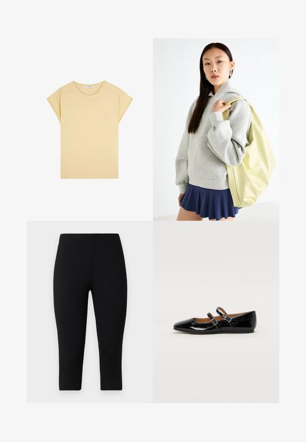 T-shirt giallo a maniche corte realizzato in tessuto morbido. Presenta un collo rotondo e un piccolo logo ricamato sul davanti. Design semplice.; Leggings capri neri realizzati in materiale elasticizzato, con una vestibilità aderente e una texture liscia, privi di motivi o accenti prominenti.; Scarpa piatta in pelle verniciata nera con punta affusolata, due cinturini con fibbia sul gambale e tacco basso e arrotondato.; Felpa grigia oversize con tasca a marsupio, abbinata a una gonna svasata blu navy. Accessorio: grande zaino giallo chiaro, di texture liscia.