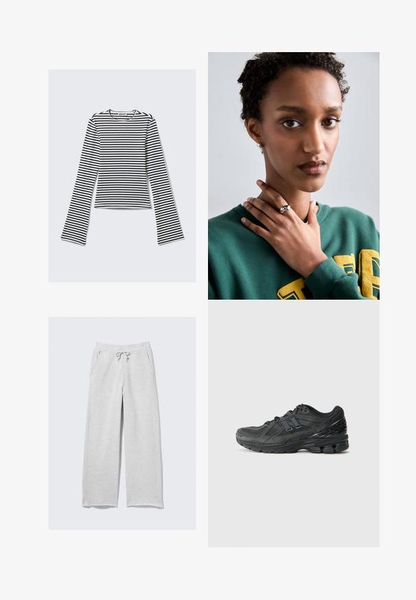 Schwarz-weiße gestreifte Langarmbluse mit rundem Ausschnitt und taillierter Silhouette. Weicher Stoff mit glatter Textur.; Helle graue Jogginghose aus weichem Stoff, mit einem elastischen Bund und Kordelzug sowie Seitentaschen. Lockerer, gerader Schnitt.; Schwarze Laufschuhe mit einem Mesh-Obermaterial, gepolstertem Kragen, synthetischen Akzenten und einer strukturierten Sohle mit sichtbaren Dämpfungselementen.; Silberner Ring mit glattem, gebogenem Design und einem Sternakzent. Modell trägt einen grünen Pullover mit gelber Schrift, die Hände in der Nähe des Nackens.