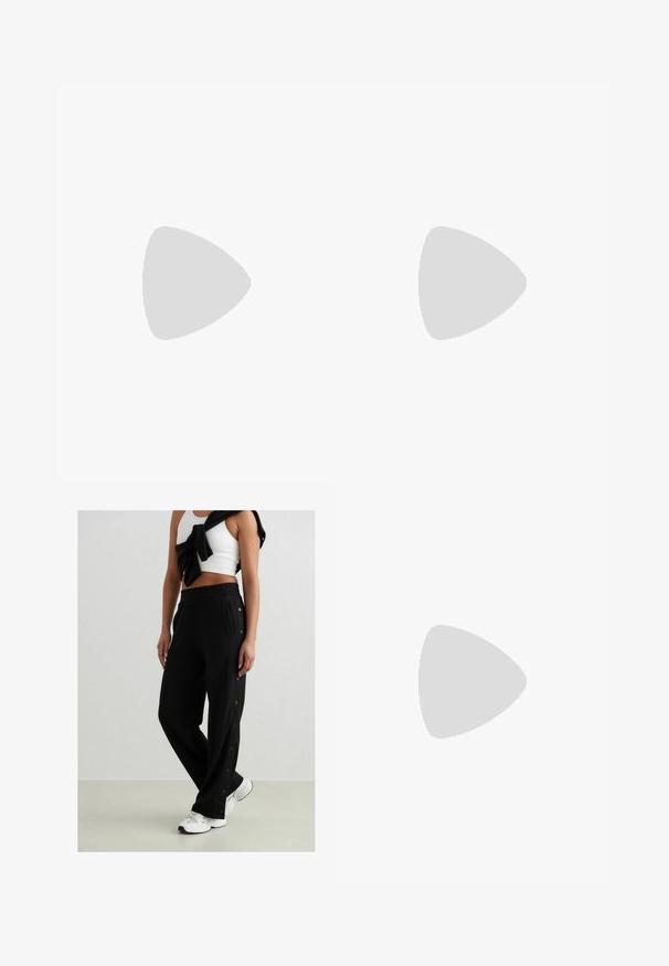 Gray sleeveless hoodie with a front pocket, cropped design, and drawstrings; worn with gray fitted jeans. Smooth texture and casual style.; Black jogging pants with side snap buttons, elastic waistband, and two side pockets. Fabric appears soft with a smooth texture.; Pointed toe slingback heel in a smooth, glossy tan material. Features a curved cutout design and a slender stiletto heel. Silver buckle detail.; Brown leather crossbody bag with a curved shape, gold hardware, and a buckle accent. Features a detachable shoulder strap.