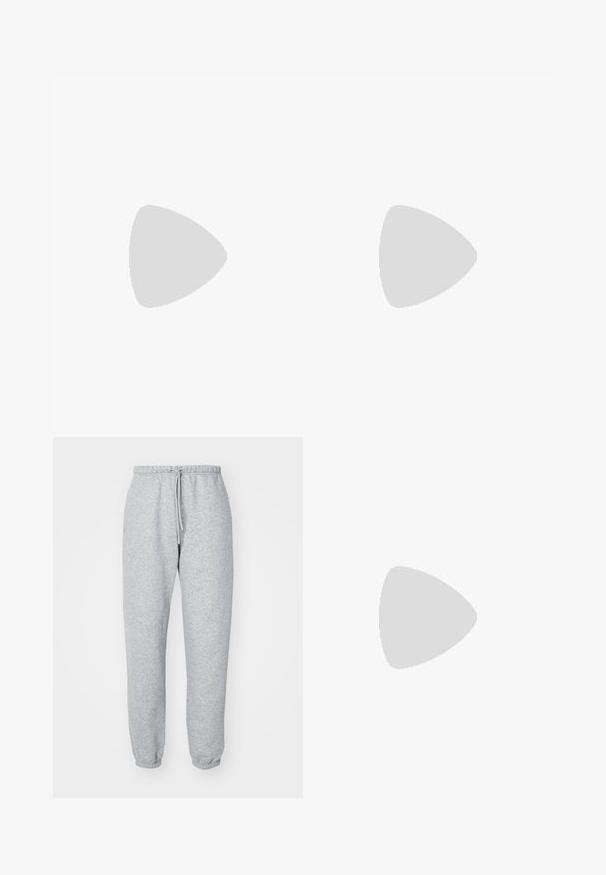 Next OVERSIZED  beżowy; Szare dresy z miękkiej, teksturowanej tkaniny. Posiadają elastyczny pasek w talii ze sznurkiem, zwężane nogawki oraz brak widocznych wzorów czy logo.; Białe skórzane sneakersy z perforowanym czubkiem, teksturowaną podeszwą i białymi sznurowadłami, w połączeniu z szerokimi czerwonymi spodniami na niebiesko-żółtym tle.; Słoneczne okulary w kratkę w kształcie prostokąta, z soczewkami w zielonym odcieniu i wzorzystymi ramkami z acetatu. Posiadają metalowe akcenty w pobliżu soczewek.