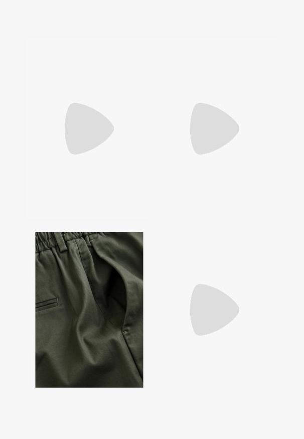 Langærmet hvid top med V-udskæring, blød tekstur og sideslidser. Har et simpelt design uden pynt eller mønstre.; Olivenfarvet stof med en blød tekstur; har en elastisk talje og sidelommer; glatte syninger synlige.; Sorte og hvide sneakers med en overdel i ruskind og læder, der har tre hvide striber, en perforeret tå og en sål i gummigummi.; Sorte solbriller med firkantet stel, mørke linser og et guld-logo på armen. Glat plastmateriale med mat finish.