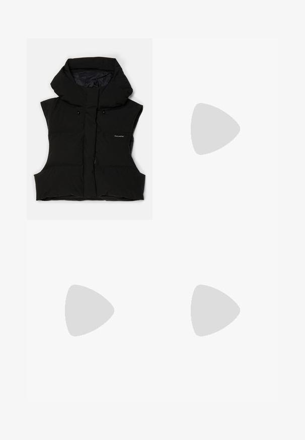 Black padded vest with a high collar, sleeveless design, front zip, and logo detailing. Material has a smooth finish and slightly glossy texture.; Dark brown ribbed bodysuit featuring thin straps, a V-neckline, and a form-fitting silhouette with an open back design.; Black leggings made of smooth fabric, featuring a high waistband and subtle branding on the front. Leggings have a slim, fitted shape.; Black ankle boots made of suede, featuring a rounded toe, lace-up design, and a thick, textured rubber sole. Unfinished hem denim skirt visible.