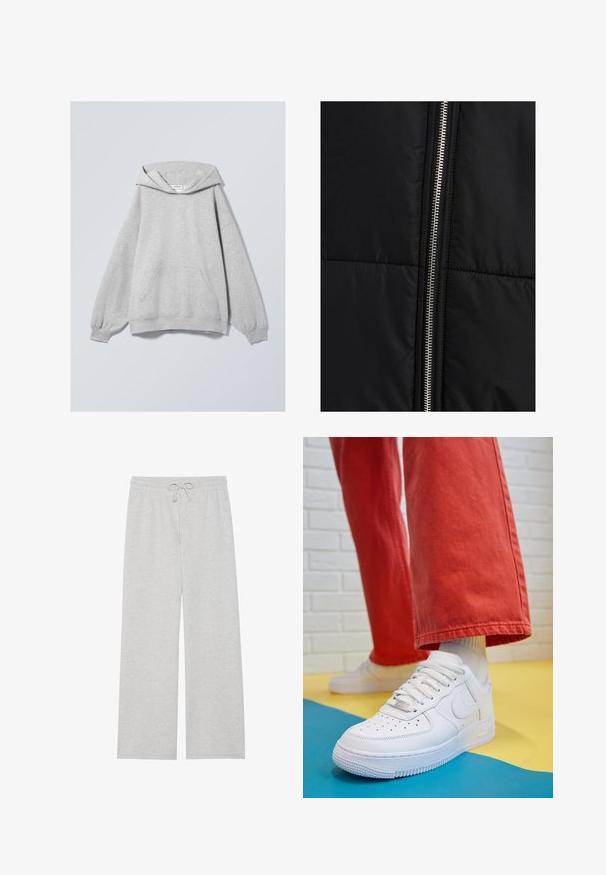 Črna puffer jakna s prešitimi teksturami, z izrazitim srebrnim zadrgo ob eni strani. Gladek material z minimalnimi oblikovnimi elementi.; Siva moška majica s kapuco, prevelik kroj, padeče ramena, velika sprednja žep, rebrasti manšeti in rob, izdelana iz mehkega bombažnega materiala.; Svetlo sivi trenirci iz mešanice mehkega bombaža, z širokim krojem, elastičnim pasom z nastavljivo vrvico in brez žepov.; Beli usnjeni športni čevlji s perforiranim prstnim delom, teksturiranim podplatom in belimi vezalkami, v kombinaciji s širokimi rdečimi hlačami in modro-rumeno ozadje.