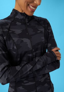 Chaquetas y chalecos de mujer para hacer deporte | Zalando