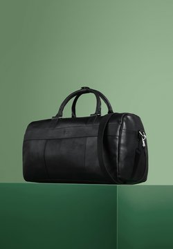 Maletas Guess - La mejor opción para vuestro viaje - TusMaletas