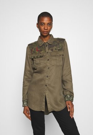 Skjorter til dame, herre og barn Desigual på nett hos Zalando.no Kjøp Desigual Skjorter til dame på nett | FASHIOLA.no
