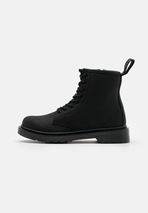 dr martens neige
