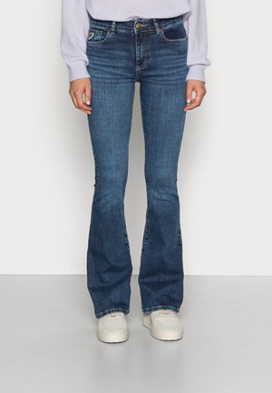 Flared Jeans Bei Zalando Fur Boho Flair