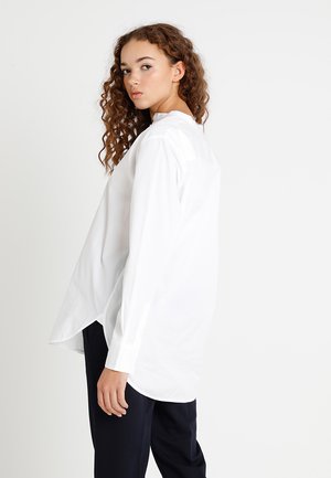 chemises lacoste soldes